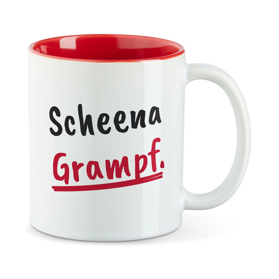 Weiße Tasse mit roter Innenseite und dem bairischen Spruch „Scheena Grampf.“ in Pinselschrift.